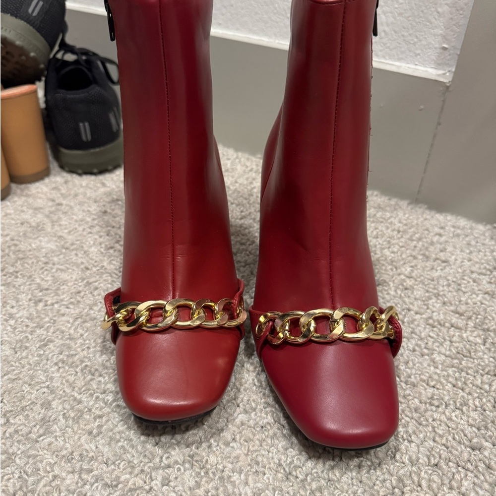 NWOT Elegant Red Leather Ankle Boots with Gold Chain